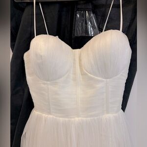 New dress worn only once before. Originally was bought for $300 USD.